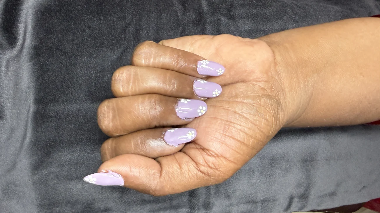 Short lilac nails with small white details