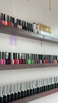 Inside the studio with neatly arranged polish shelves